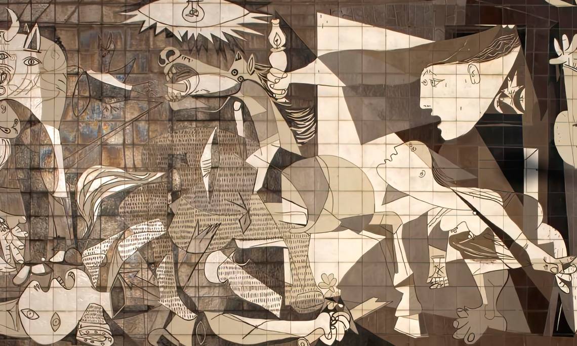 Reproduction de « Guernica » de Pablo Picasso sur un mur de la ville de Guernica en Espagne - source : WikiCommons